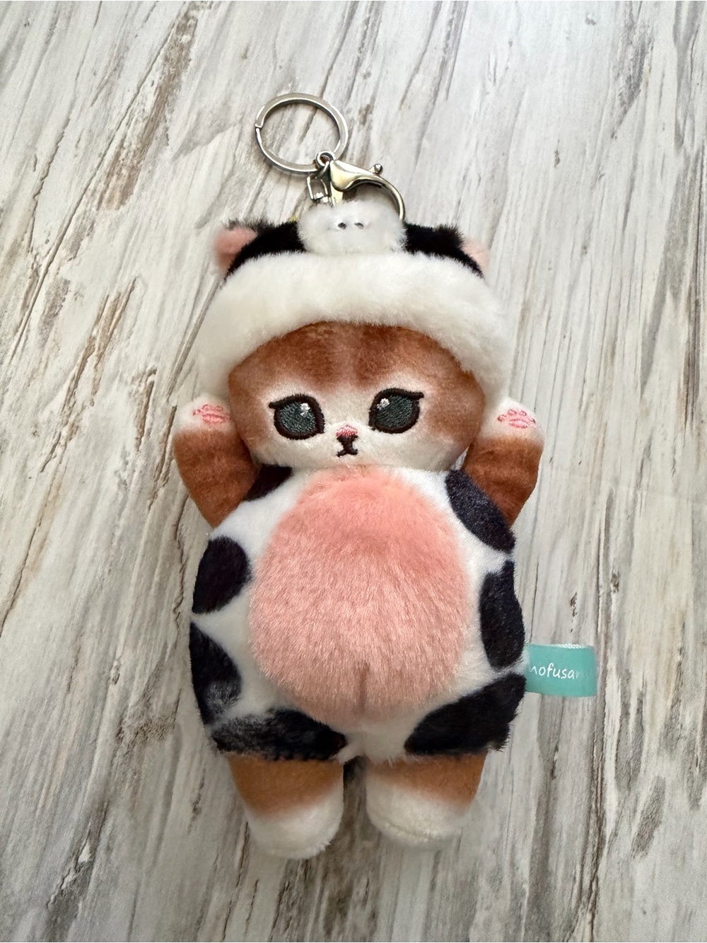 Mofusand cat plush with cow costume